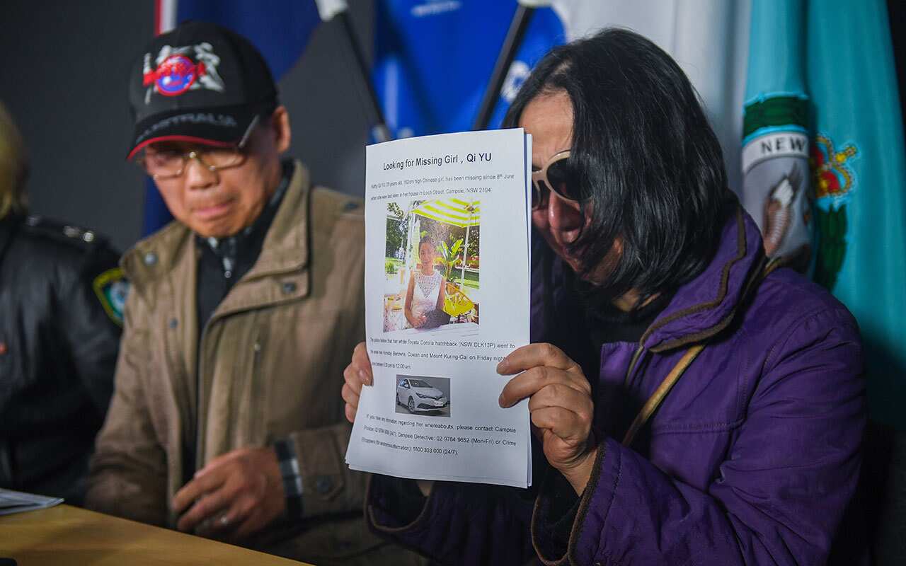 Parents of missing woman Qi Yu, Qing He (right) and Zhihe Yu (left) are seen during a police press conference in Sydney, Tuesday, June 26, 2018. 