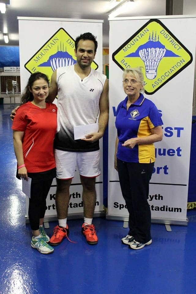 Receiving prize in ceremony by Mountain district badminton association