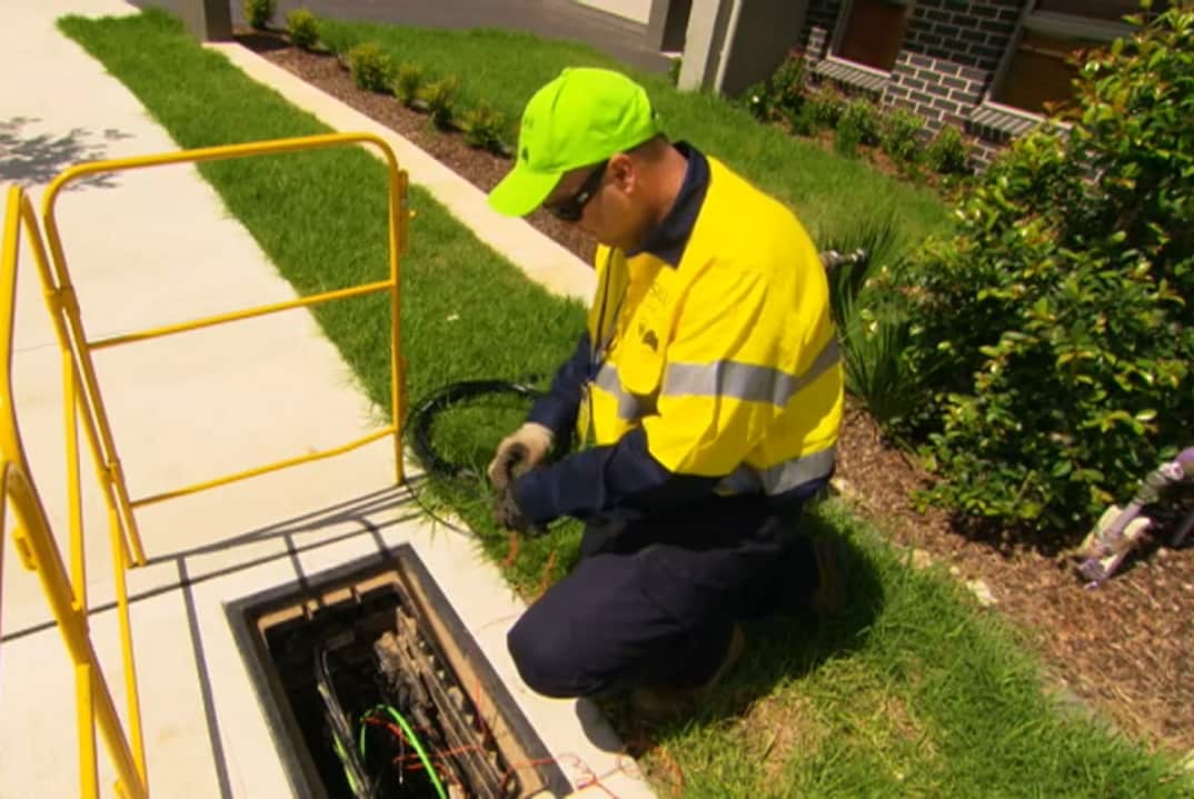 Workers install the NBN.