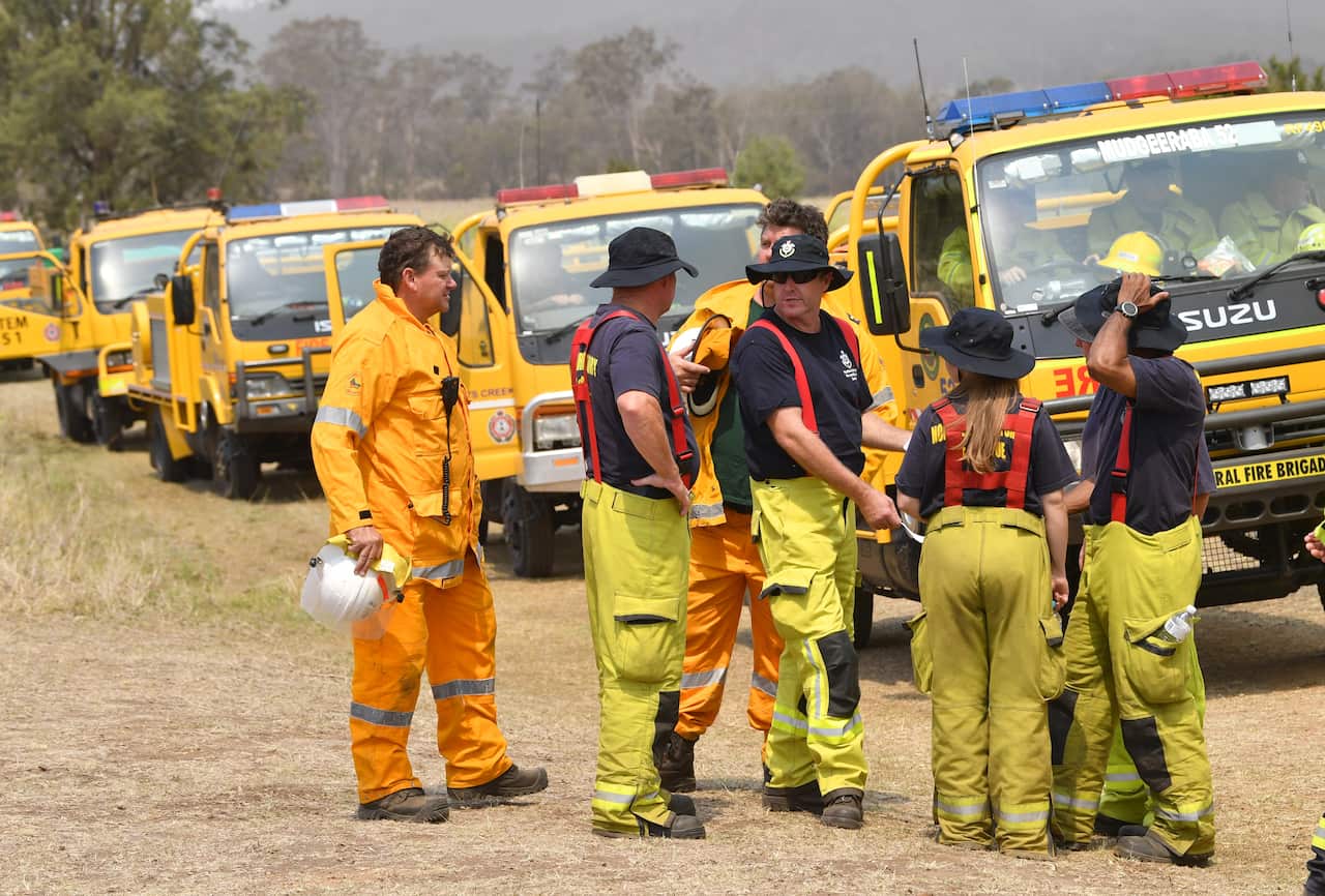 Rural firefighters preparing to fight fires at Spicers Gap, south west of Brisbane.