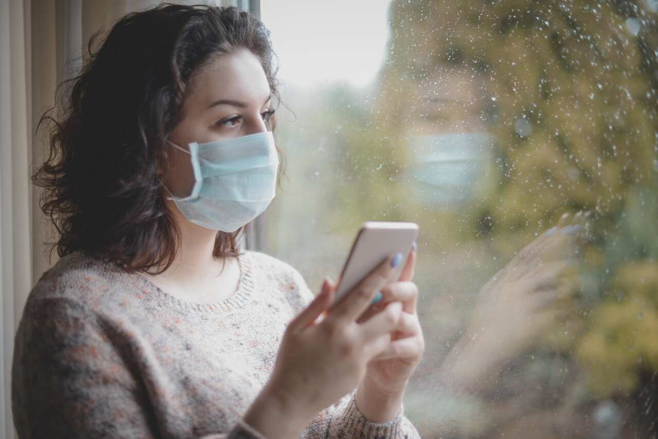 Young woman wearing mask