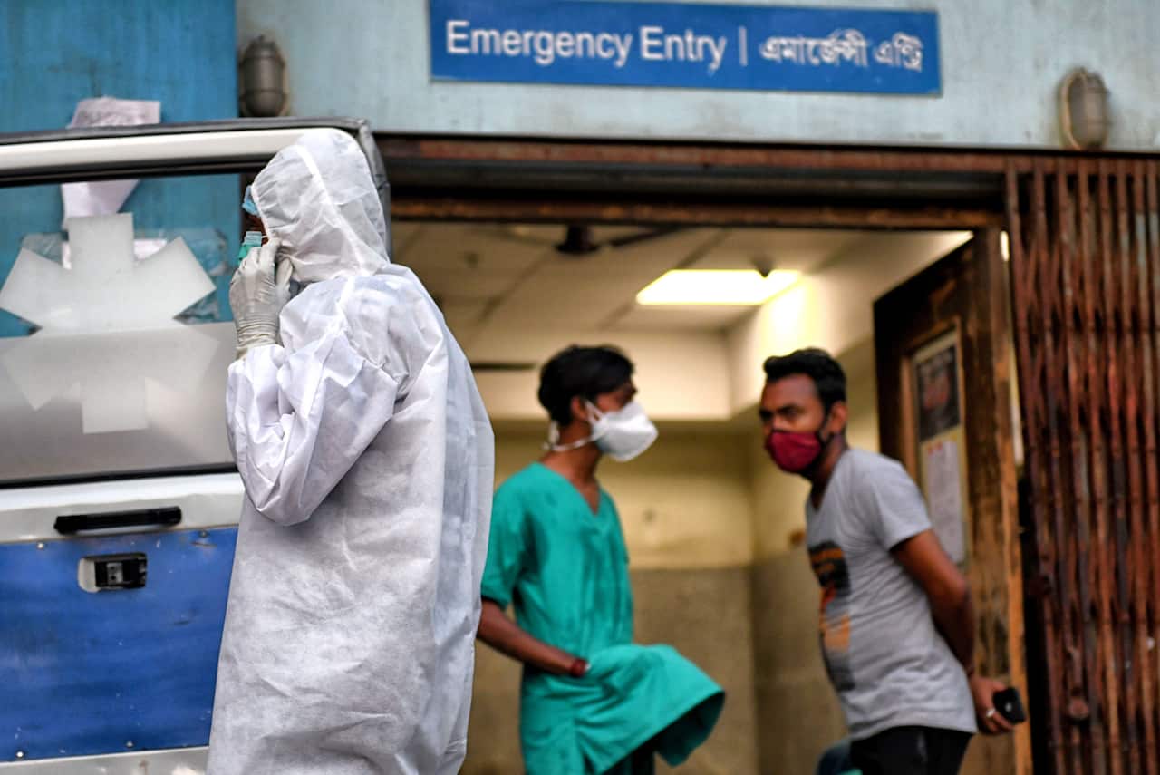 A file photo of a health worker wearing a protective suit at the MR Bangur government hospital in Kolkata.India.