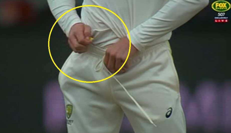 Cameron Bancroft caught with yellow tape.