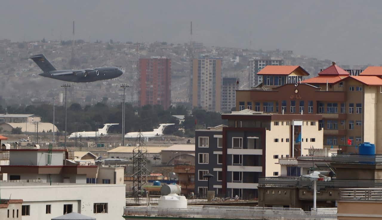 A Military aircraft takes off at the Hamid Karzai International Airport in Kabul, Afghanistan, 30 August 2021. 
