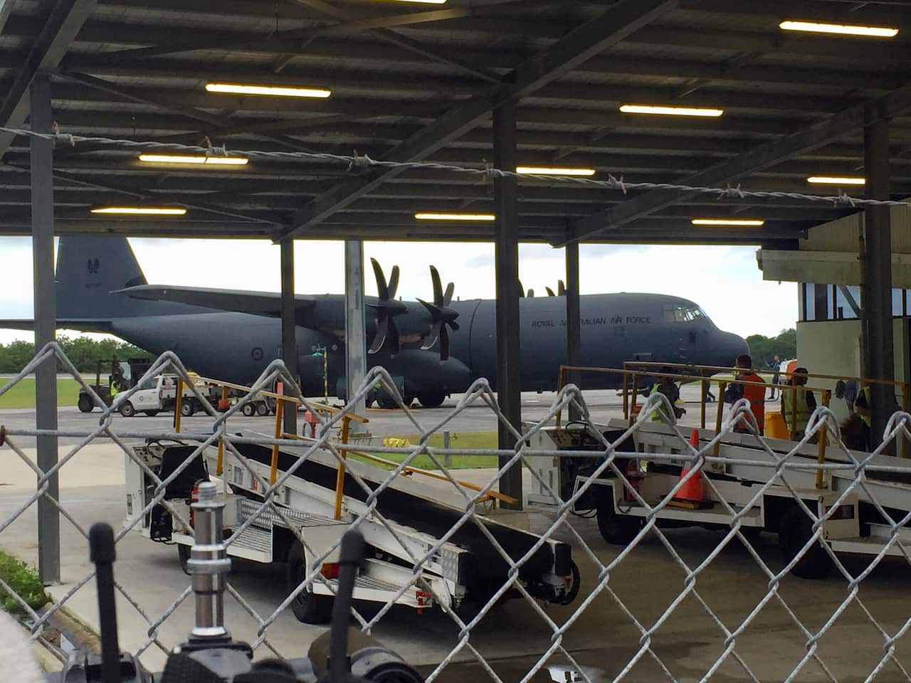 A C-130 Hercules is seen on a runway at Christmas Island.