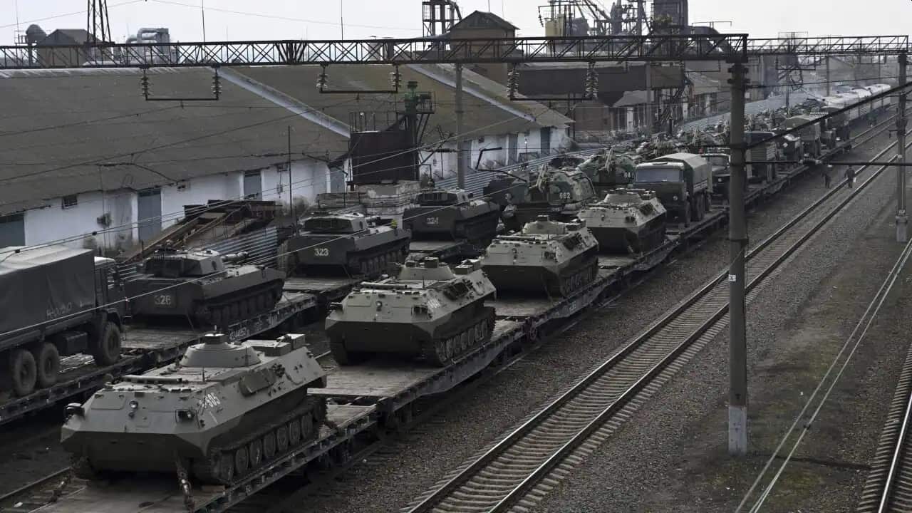 Russian armoured vehicles are loaded onto railway platforms at a railway station in region not far from Russia-Ukraine border, in the Rostov-on-Don region, Russia.