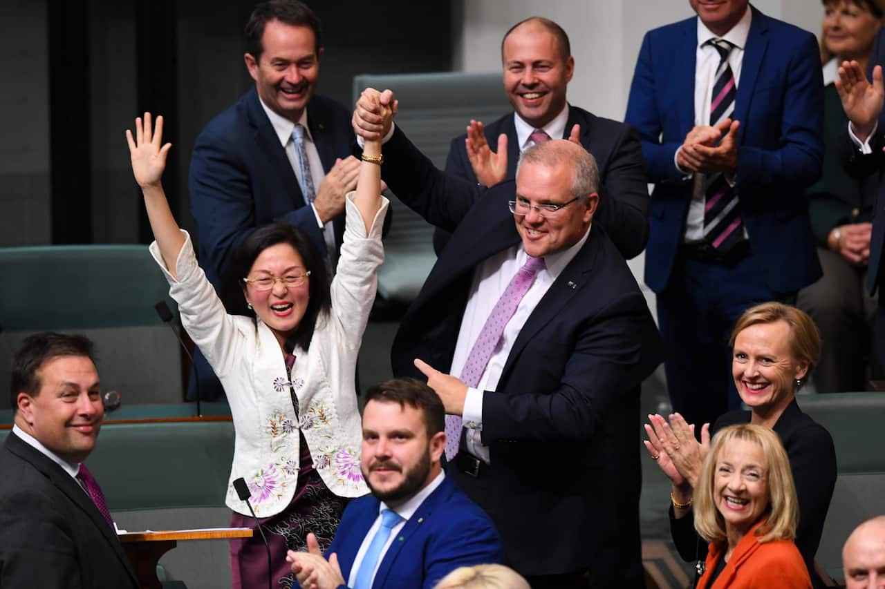 The Member for Chisholm Gladys Liu is congratulated by Australian Prime Minister Scott Morrison at Parliament House in Canberra.