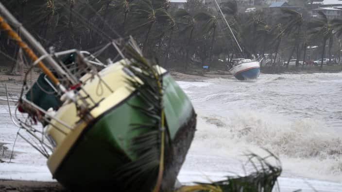 Cyclone Debbie was there! Boats are seen washed ashore at Airlie Beach