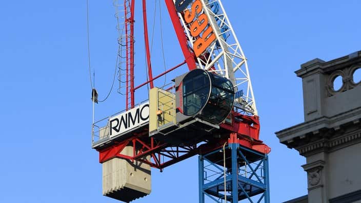 A damaged crane is seen in Richmond, Melbourne, Tuesday, July 24, 2018. Wild winds overnight have impacted the structural integrity of a construction crane, resulting in the evacuation of residents and closure of Bridge road. 