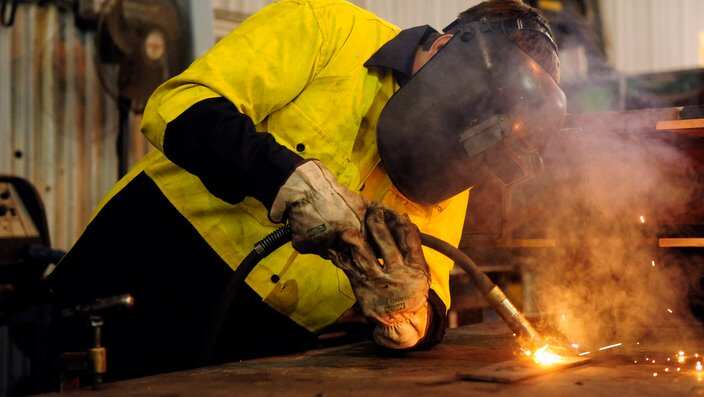 Trainee steelworker Taylor Rainik at One Steel in Melbourne, Tuesday, April 30, 2013. (AAP Image/Julian Smith) NO ARCHIVING