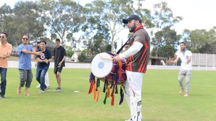 Afghans preform Atan during the multicultural cricket tournament finals hosted by AAYA