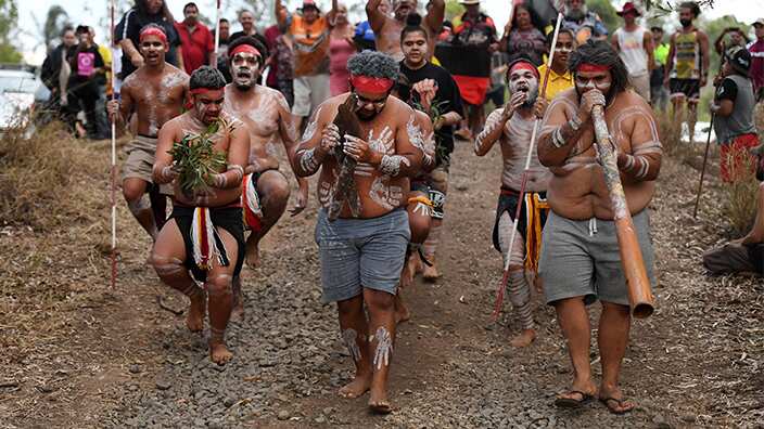 Aboriginal dancers perform in celebration