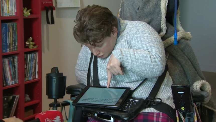 Sam Petersen uses a speech-generating device to communicate.