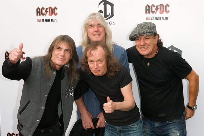 From left: AC/DC band members Malcolm Young, Cliff Williams, Angus Young and Brian Johnson.