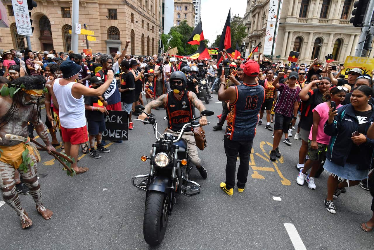 Protestors on motorbikes join the Invasion Day rally in Brisbane.