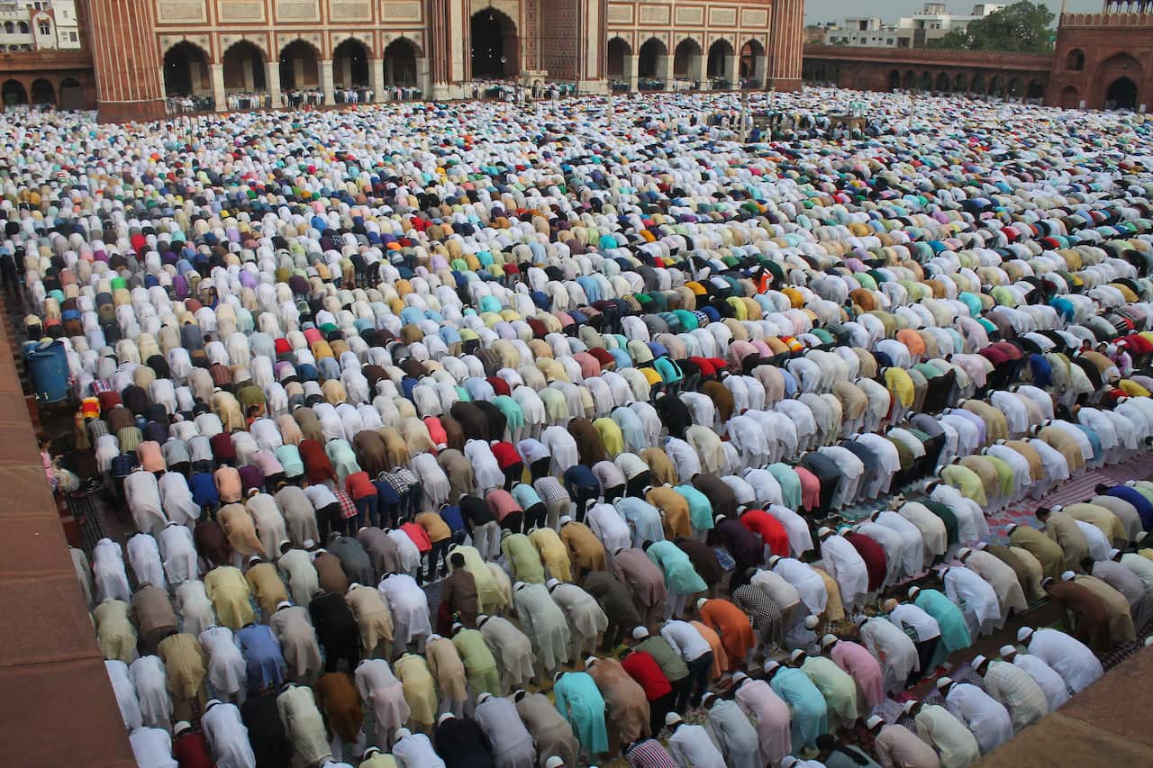 People offer prayers during Eid al-Fitr at the Jama Masjid mosque in New Delhi