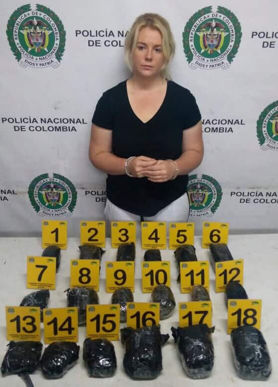 This April 12, 2017 photo released by Colombia's National Police press shows Australian Cassandra Sainsbury after she was arrested at Bogota Airport