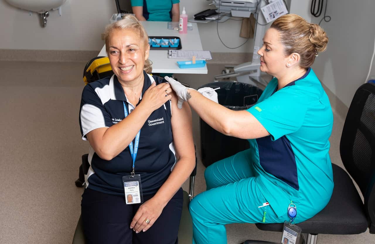 A frontline worker receives the COVID-19 vaccine at Gold Coast University Hospital in Queensland
