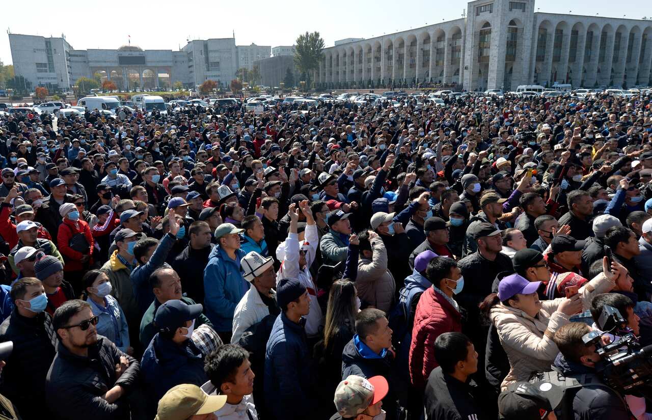 People protest during a rally on the central square in Bishkek, Kyrgyzstan on 7 October.