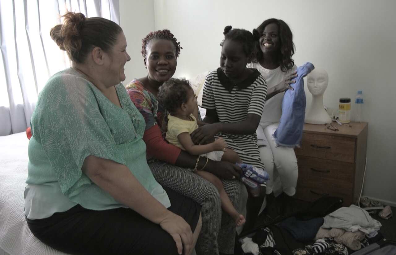 Campaigner with family and supporters in Brisbane