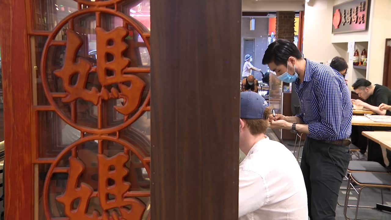 Allan Chu serving customers at Mother Chu in Sydney's Chinatown. 