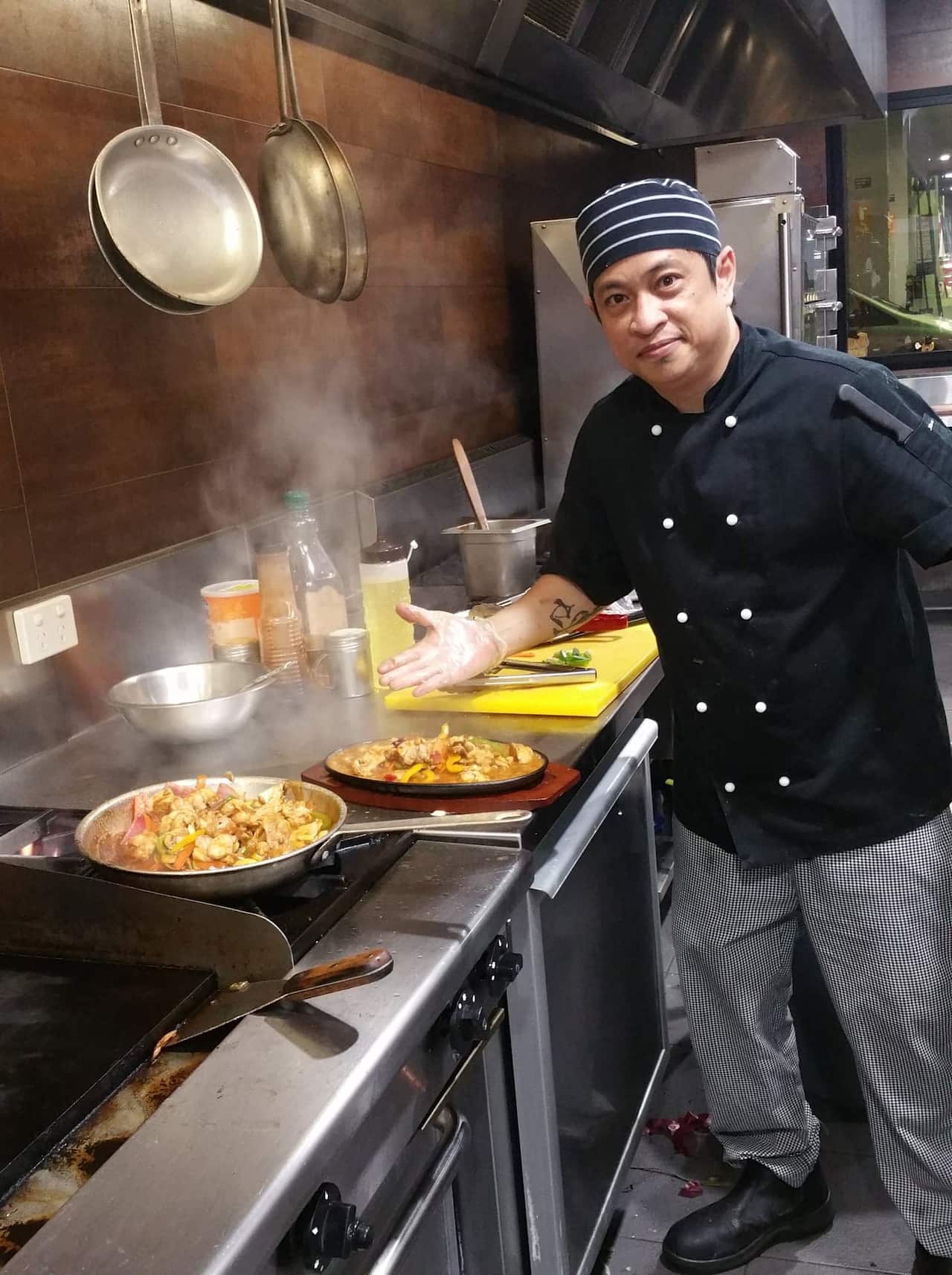 Aldrin Dabuan as a cook in Sydney, Australia