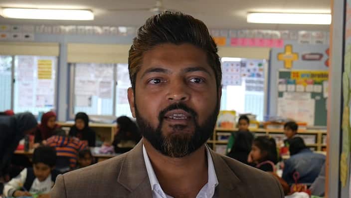 Urdu language school principal, Ali Khan.