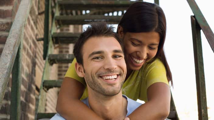 Young Couple on Fire Escape