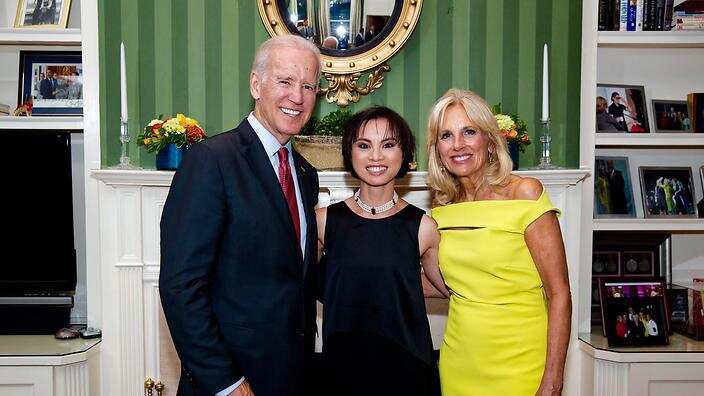 Vice President Joe Biden and Dr. Jill Biden stand for a photo line during an LGBT reception, in the library at the Naval Observatory Residence, in Washington, D.C., June 24, 2014. (Official White House Photo by David Lienemann) 
