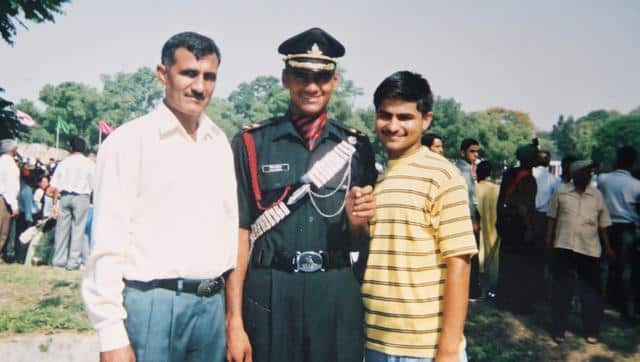 Amit Deswal with his father and brother