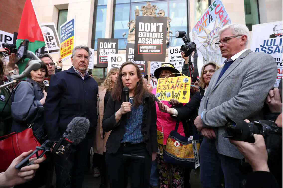 Stella Morris the wife of Julian Assange talks to the media outside Westminster Magistrates' Court in London, after Wikileaks founder Julian Assange was formally issued with an order for extradition to the US
