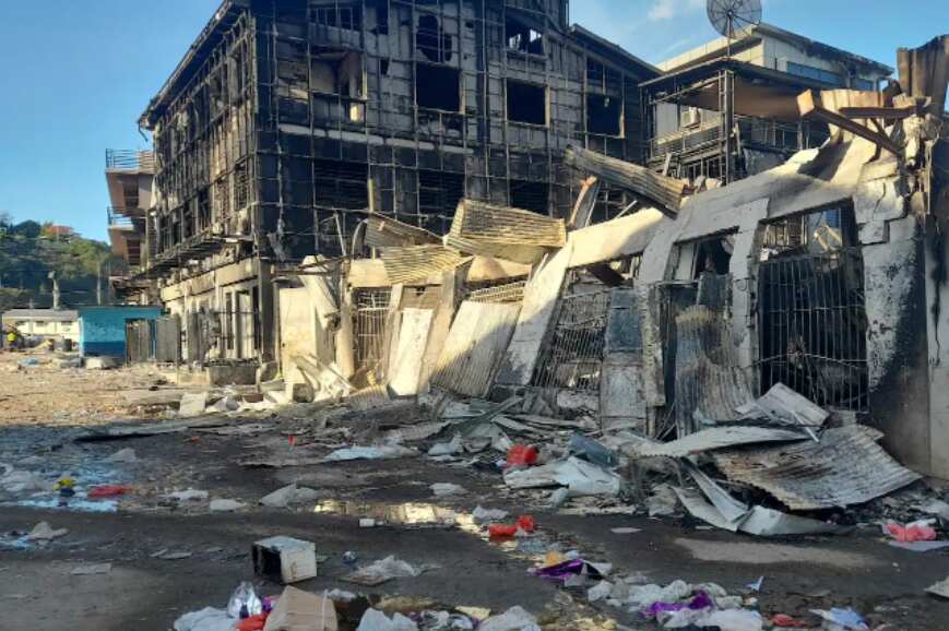 Honiara's Chinatown was razed by fire when riots broke out in November 2021. 