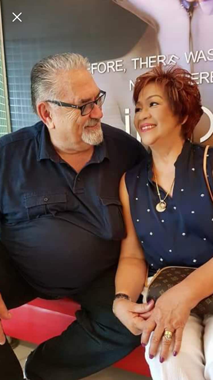 With husband Derek Mart