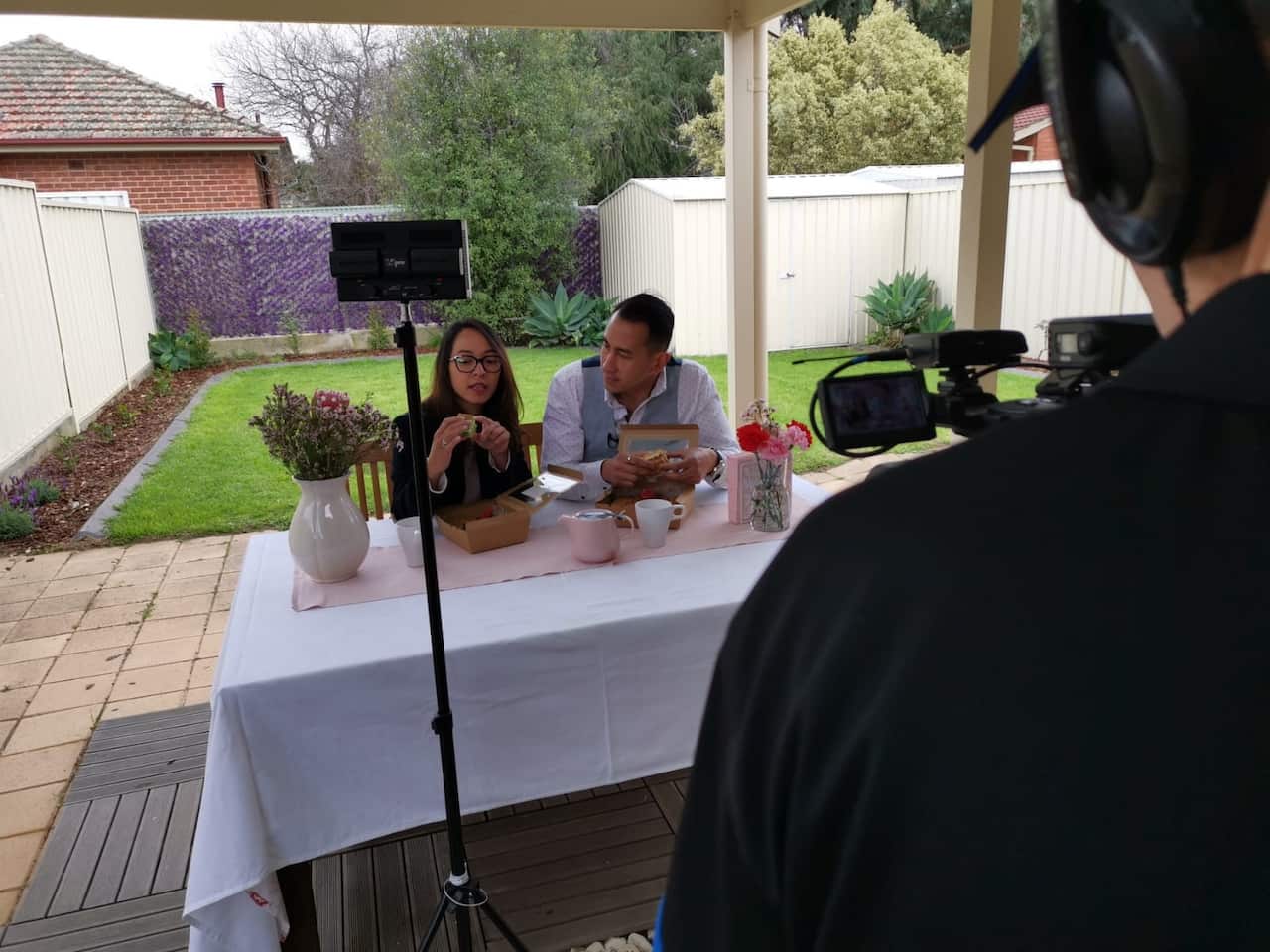 Amalia Sosrodiredjo and her co-host, Romo Branajaya in the making of the video promo ‘Adelaide Best 5 in 5 Indonesian Food’ Channel 44, 10 & 17 Aug 2020. 