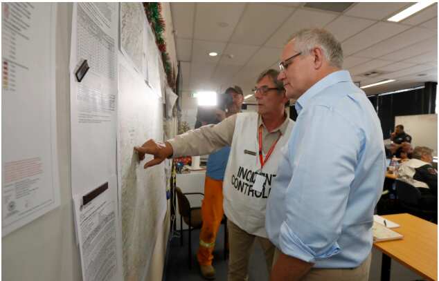 Prime Minister Scott Morrison speaks with CFS staff in South Australia. AAP