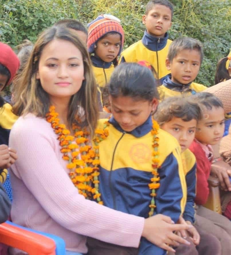 Ashna Thapa with members of Nepali community