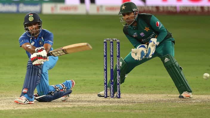 India's Ambati Rayudu, left, plays a shot during the one day international cricket match of Asia Cup between India and Pakistan in Dubai, United Arab Emirates, Wednesday, Sept. 19, 2018. (AP Photo/Aijaz Rahi)