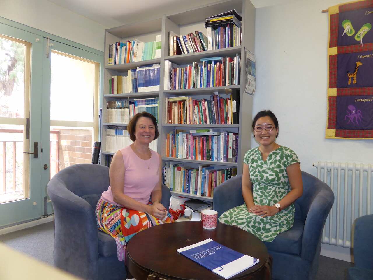 Dr Audrey Wang (right) pictured with Professor Sharynne McLeod at Charles Sturt University