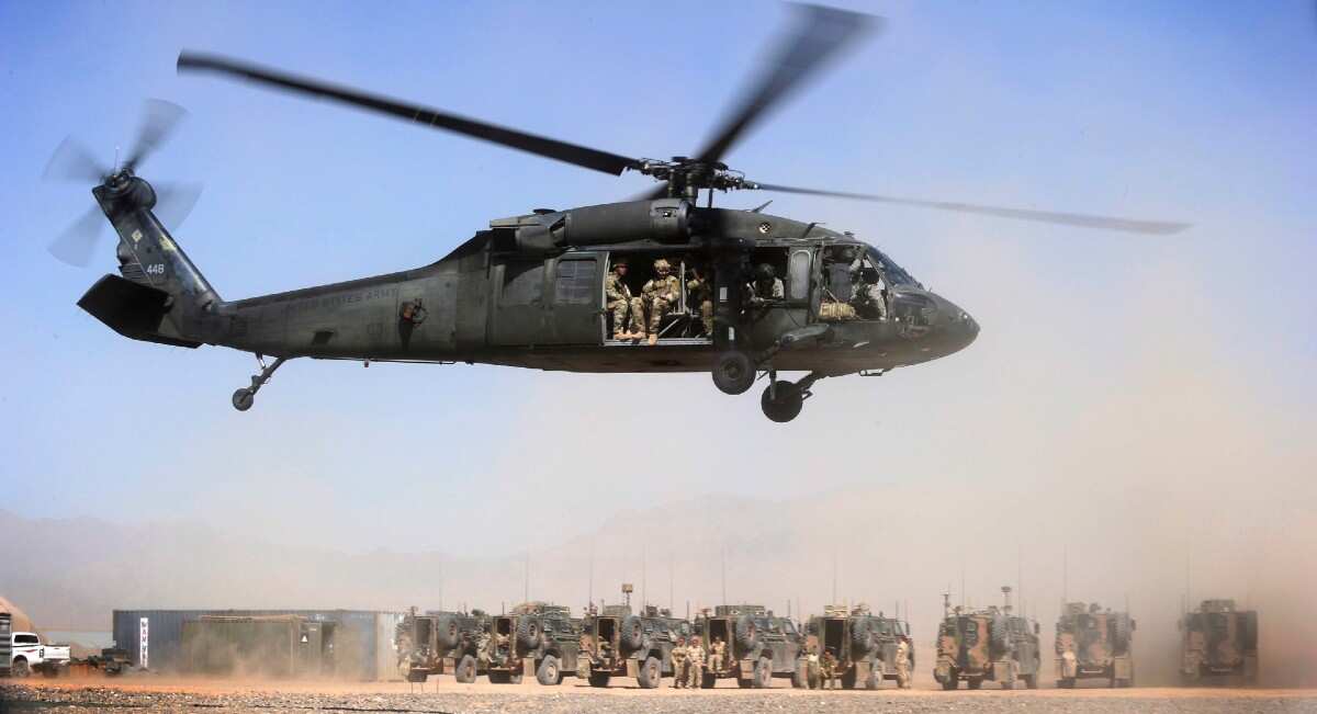 Afghan Officers from the Provincial Police Response Company and Australian Special Operations Task Group Soldiers lift off in a UH-60 Blackhawk helicopter as part of the Shah Wali Kot Offensive. 