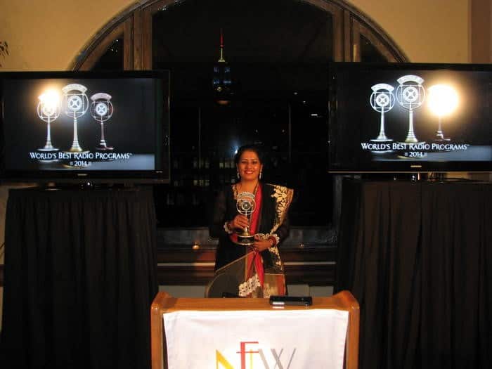 Manpreet receiving the Silver trophy at New York Festivals for World's Best Radio
