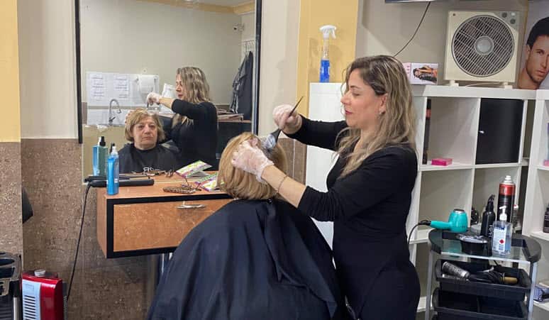 Awaz Botani with customer