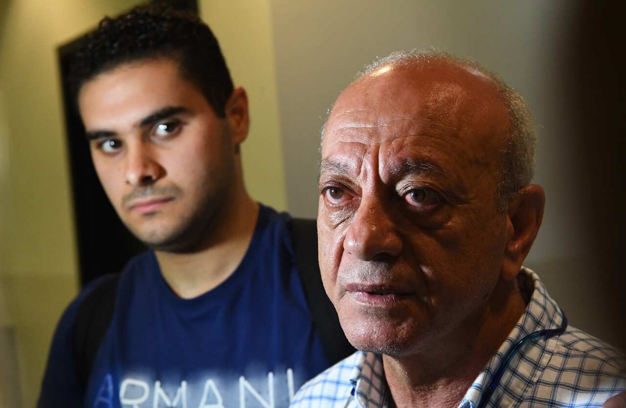 Aiia Maasarwe's father Saeed Maasarwe (right), father of Aiia Maasarwe speaks to media before departing at Tullamarine Airport, Melbourne.