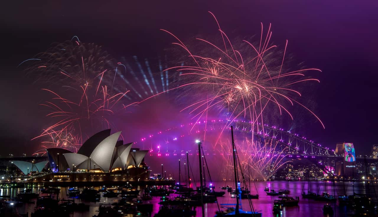 Fireworks light up the sky over Sydney Harbour