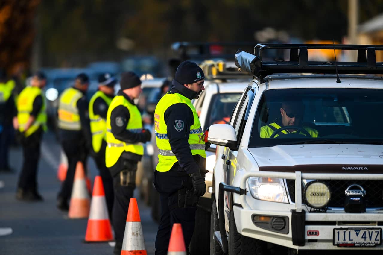NSW Police officers check cars 