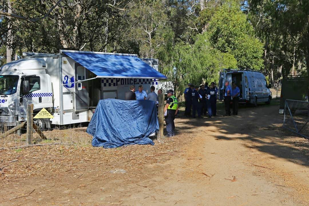 Police forensics investigate the death of seven people in a suspected murder-suicide in Osmington, east of Margaret River, 260km south west of Perth, Friday, May 11, 2018. (AAP Image/ The West Australian POOL, Justin Benson-Cooper) NO ARCHIVING