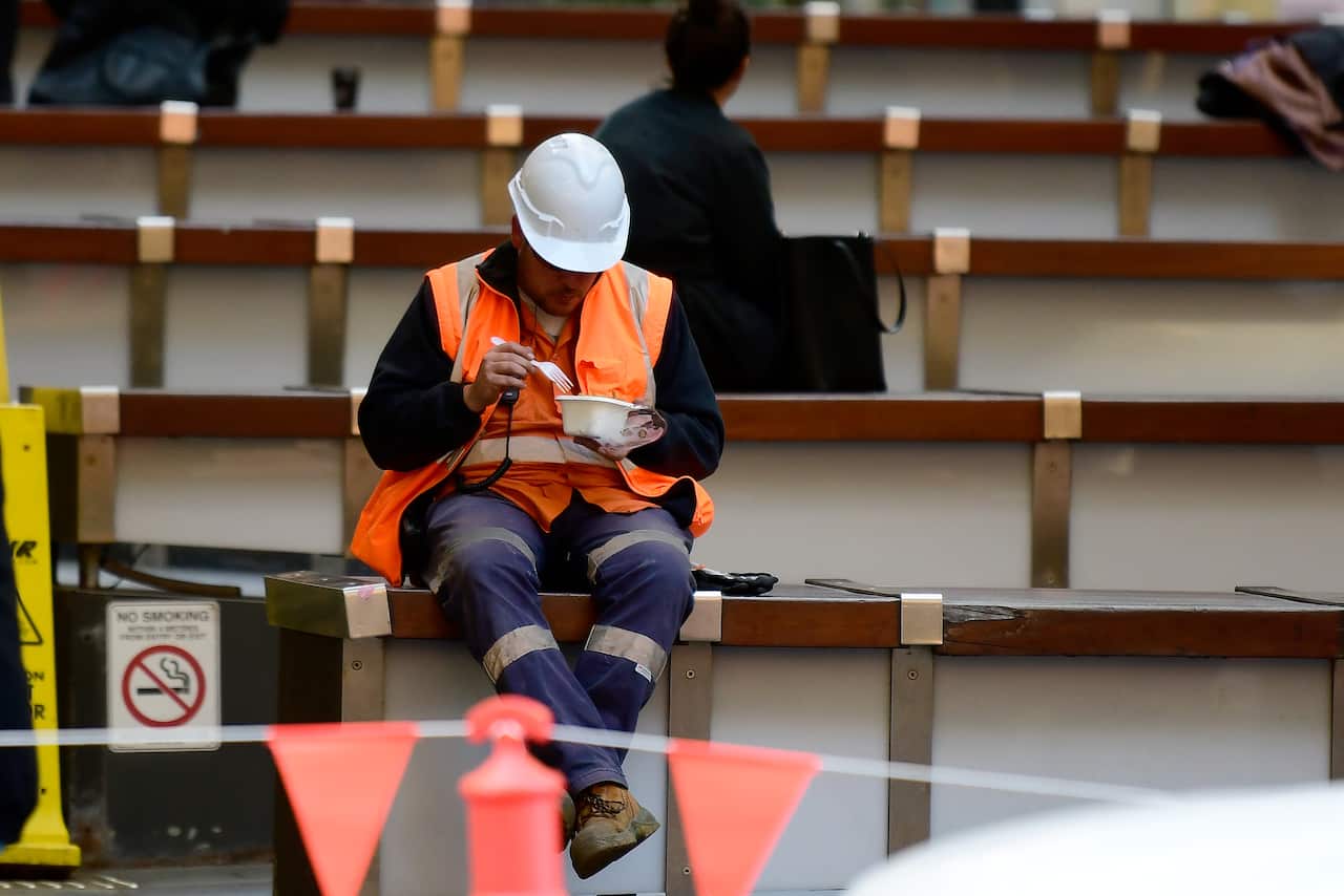 Construction workers are seen in Sydney, Thursday, May 16, 2019