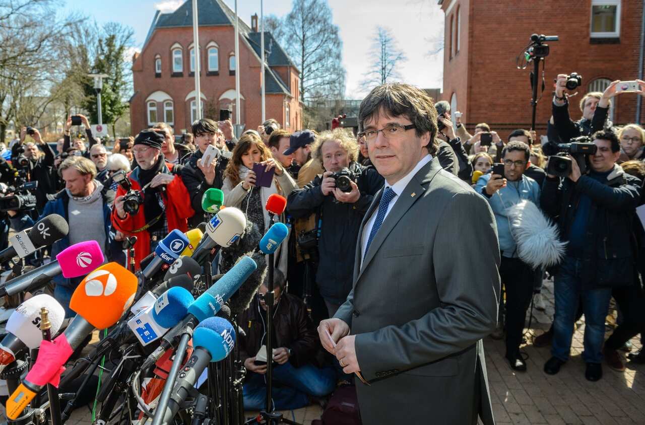 Former Catalan leader Carles Puigdemont gives a press statement after leaving the 'Justizvollzugsanstalt (JVA) Neumuenster' prison 