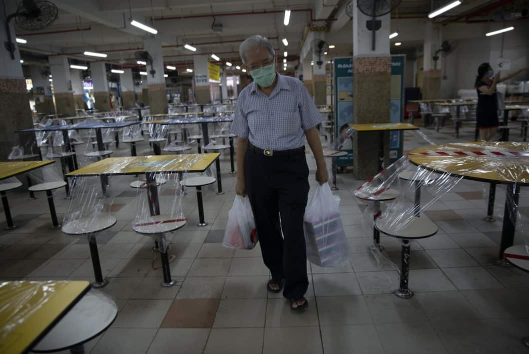 An empty hawker centre is Singapore.