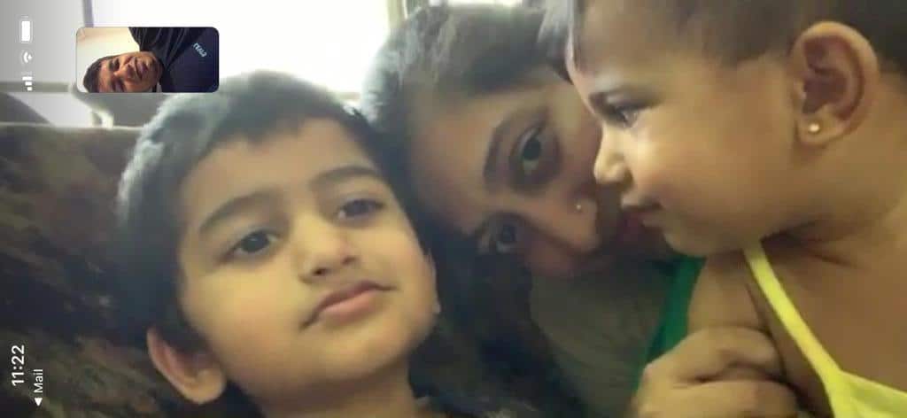 The family communicate via video chat.