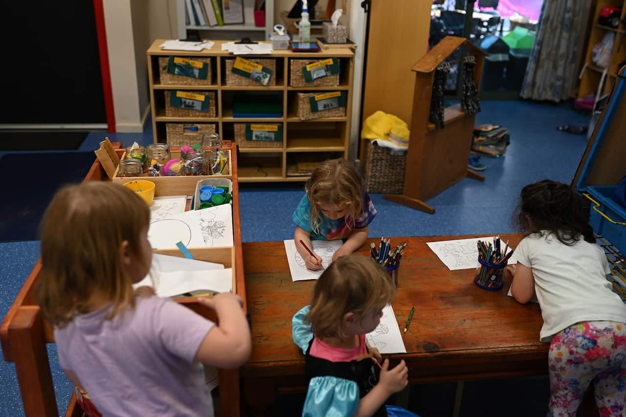 A small group of children play at the Robertson Street Kindy Childcare Centre in Helensburgh south of Sydney.